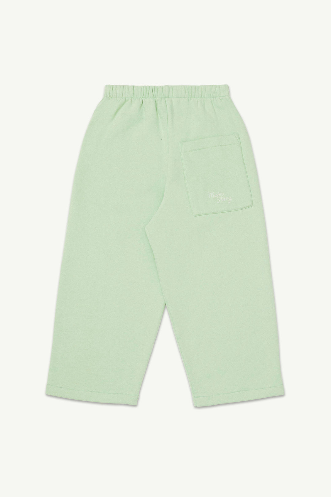 Light matcha green lounge pants with an elastic waistband and a logo embroidered back pocket.